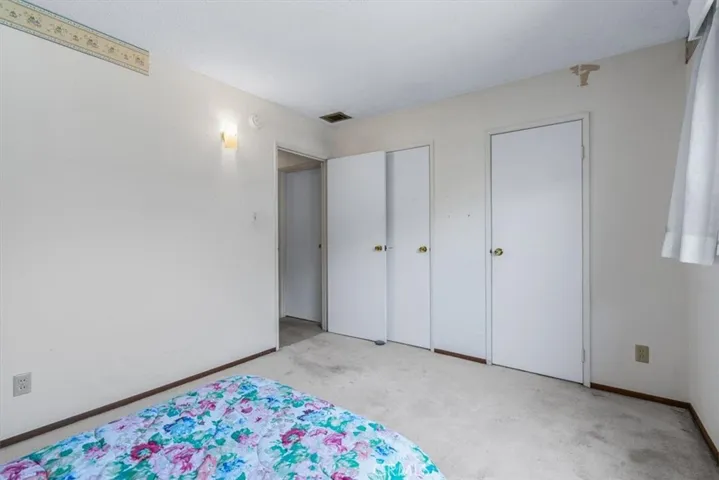 Bedroom 2 has a larger closet (full length of the wall) than is typical for homes of this era, with two single doors into it.
