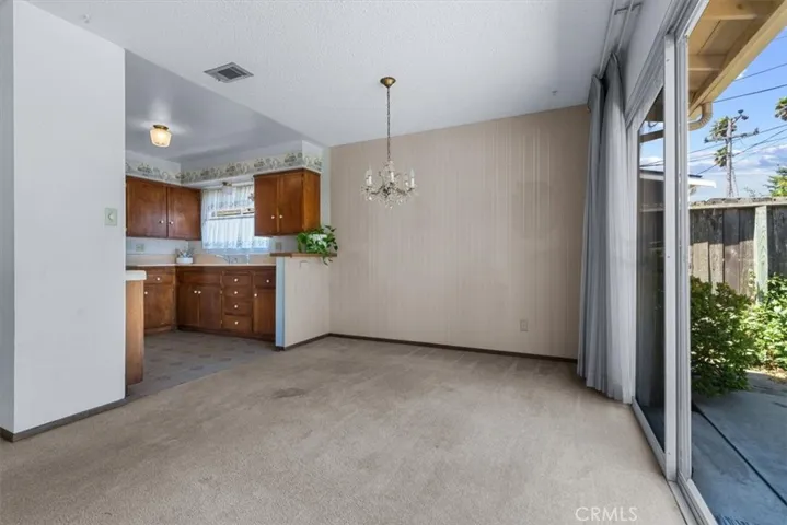 Sliding Door in Dining Room opens onto back yard patio.