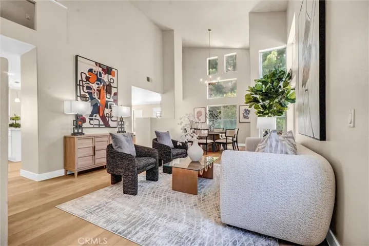 Note the lovely open floorpan with high ceiling.