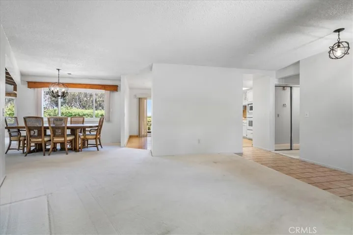 Formal living room looking towards dining.