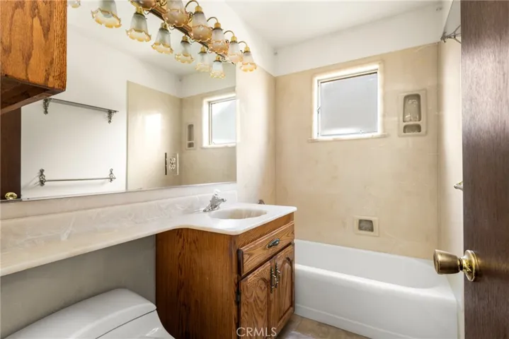 Hall bathroom with bathtub