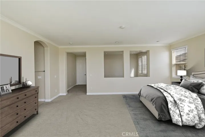 Primary Bedroom with retreat area and adjoining bath