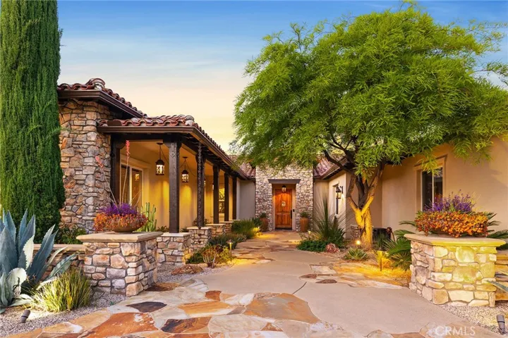 Custom hardscapes and landscaping throughout!