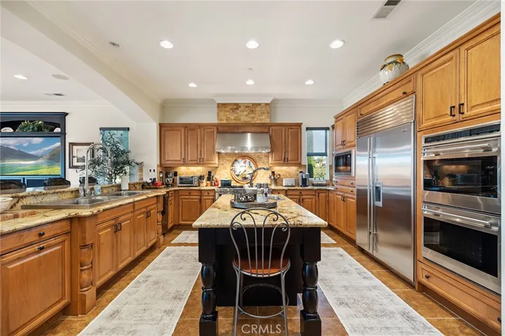 Double Oven, enormous triple sink, built in Wolf Refrigerator/Freezer