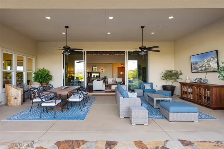 Covered and enclosed on 3 sides, this patio is perfect for outdoor living!