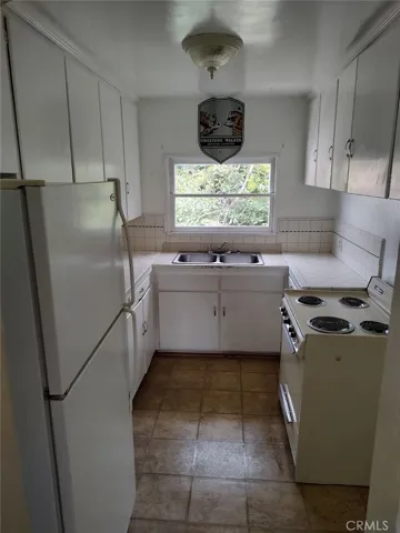 Upstairs back unit kitchen