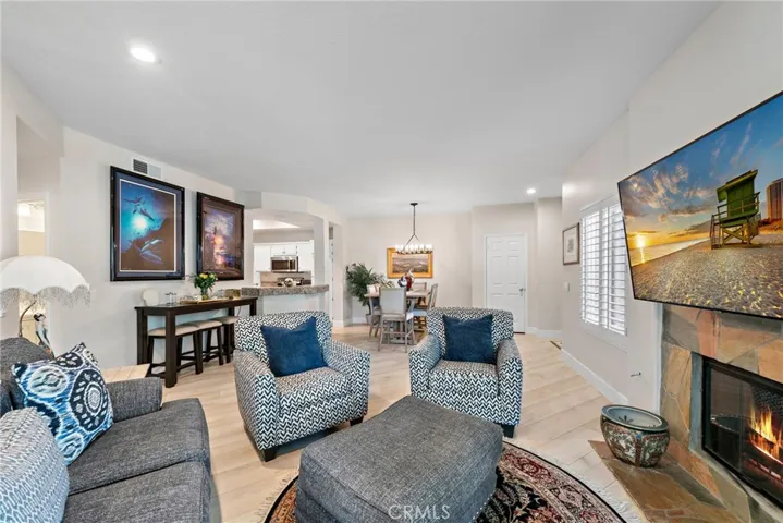 From the living room, take in the spacious open-concept layout that effortlessly connects to the kitchen.