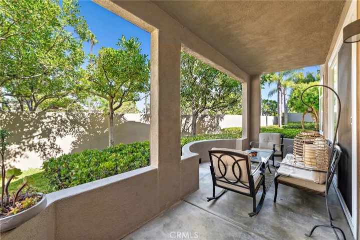 This large patio is the perfect place to unwind, with comfortable seating arrangements.
