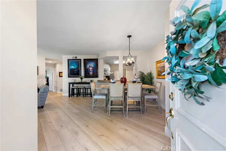Enter into a bright, open-concept living space.
