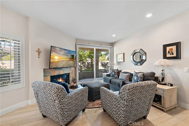 Relax in the spacious living room with plenty of natural light and flow.