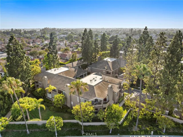 Enjoy a stunning bird’s-eye perspective of the condo, showcasing its layout and surrounding features.