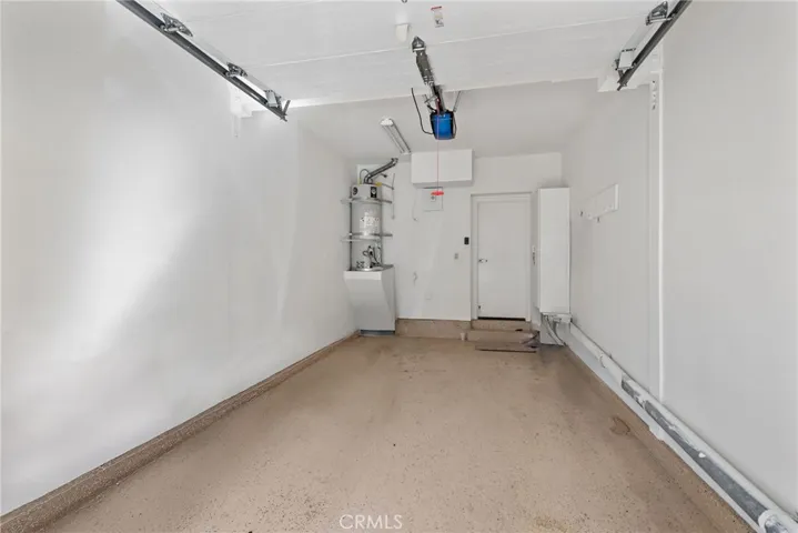 Single car detached garage with storage.