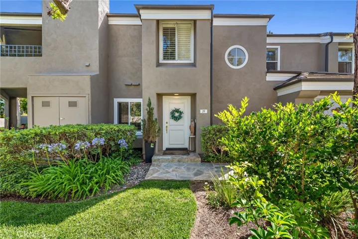 Welcoming front entry leads directly into this lower-level condo.