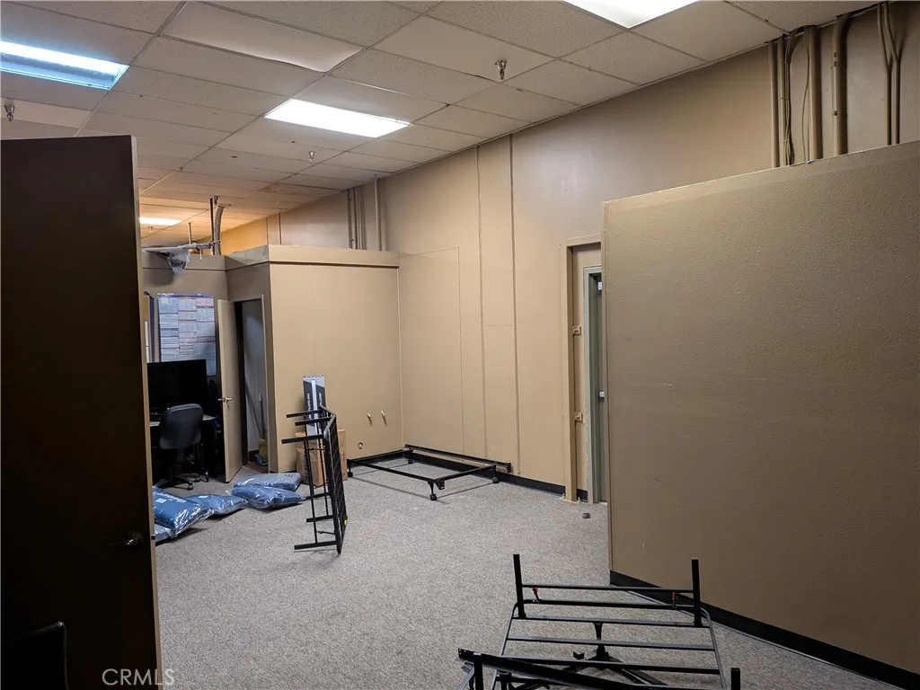 Back office/storage area with mop room and electrical room.