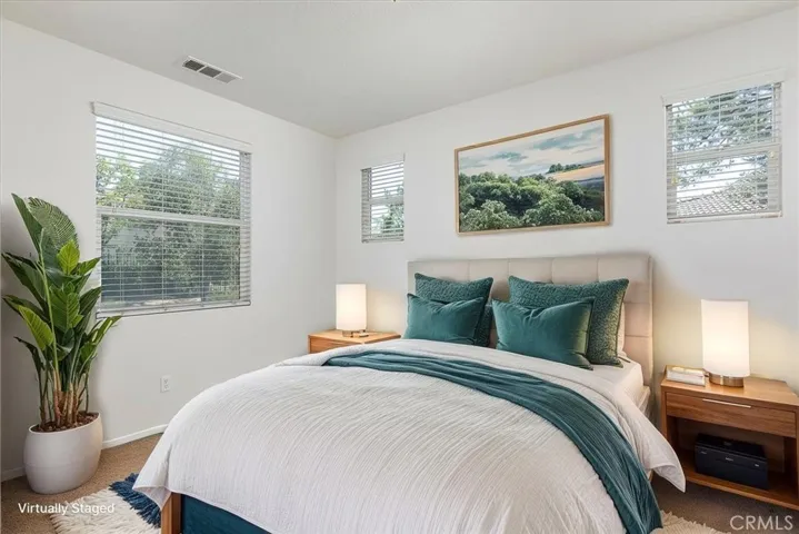 Primary suite.  Image has been virtually enhanced.