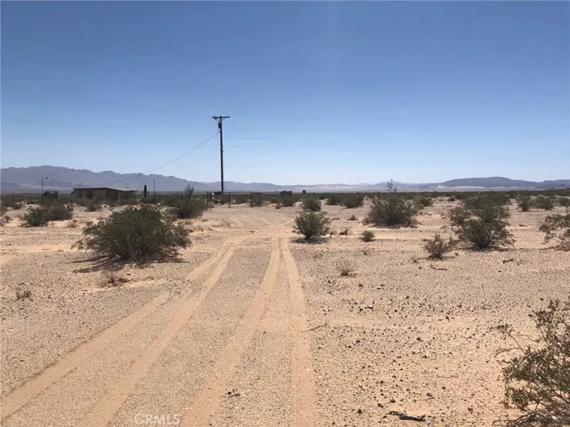 Access road to your parcel. View is looking east. Photo is the approximate middle of the southern boundary.