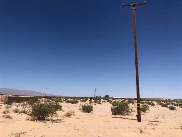 Utility pole at the South west corner.