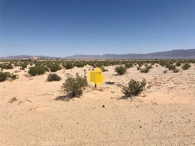 View looking north. Sign on southern boundary.