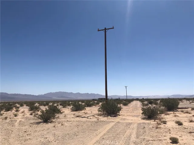 View looking east. First utility pole is the SW corner.