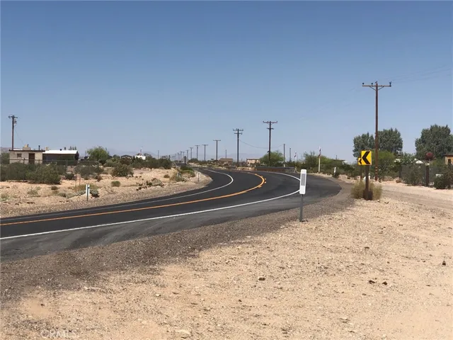 29 Palms Highway is the paved road and then you go north on Steeg.