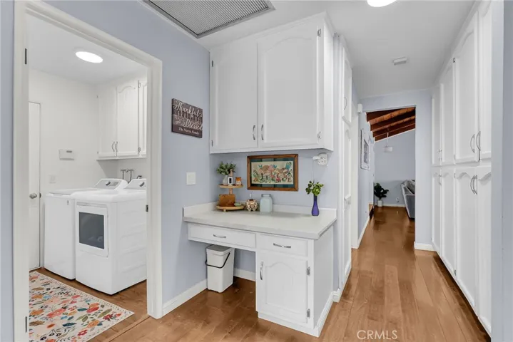 wood flooring, extra large storage and indoor laundry