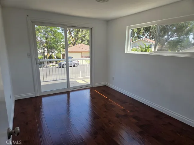 Bedroom next to the bonus with access to exterior balcony