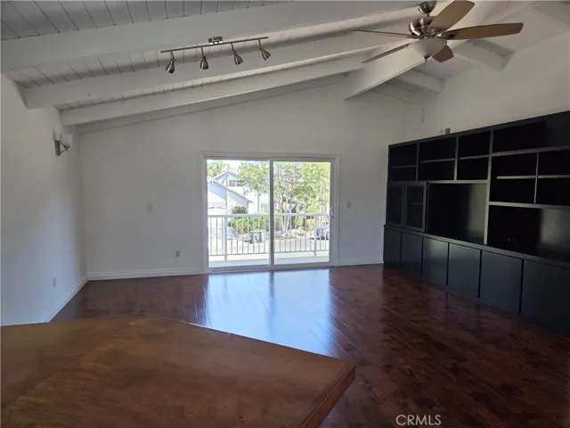 Spacious Bonus room above the garage with built in entertainment center and sliding doors leading to the exterior   balcony