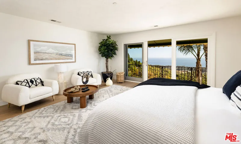 Primary Suite with balcony and