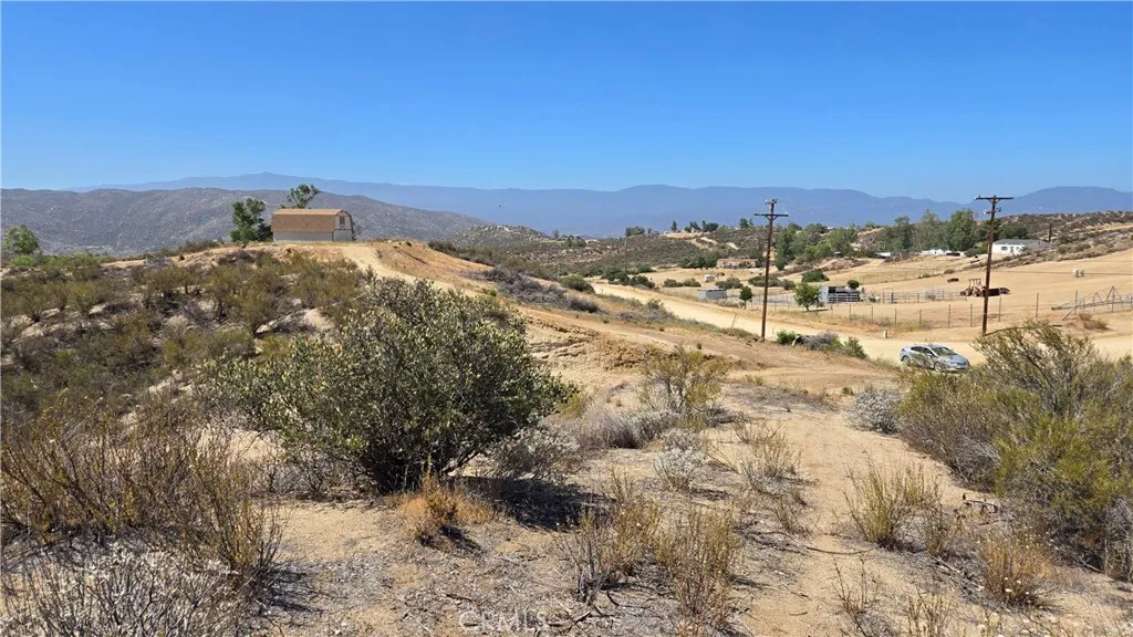 SW corner of the property, on the entry way, looking towards neighbor to the S.