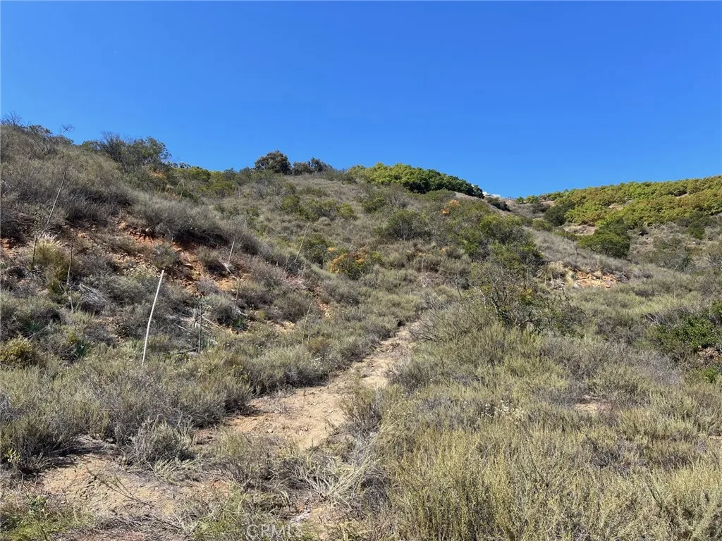PROPERTY ON LEFT  VERY NEAR  THE FUTURE ENTRANCE.  SELLER  WILL SURVEY PRIOR  TOA CLOSING