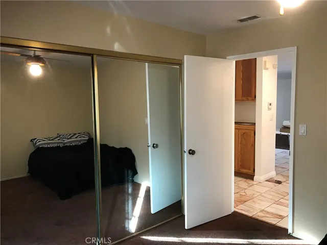 Center bedroom, entry and view of hallway