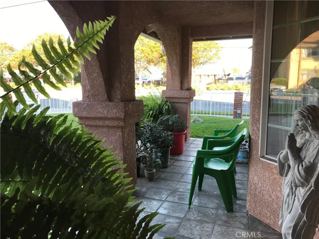 Covered patio to front door Front door