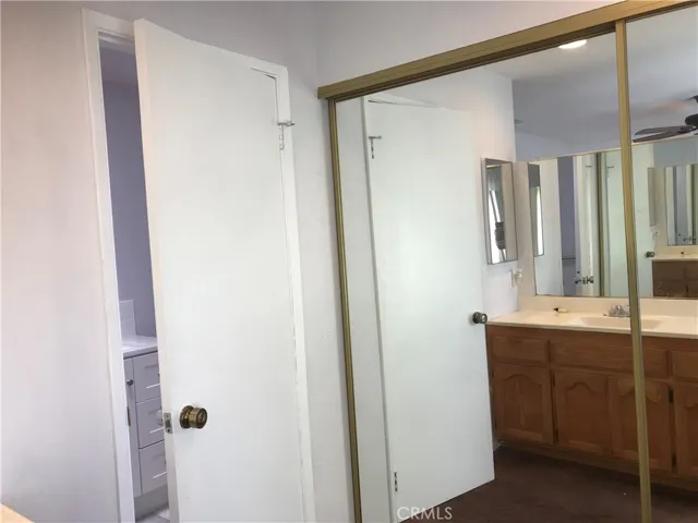 Door entry to updated primary bathroom