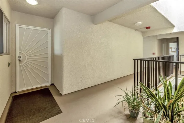 Front entry door - community laundry is at right - adjacent elevator - sooo convenient!