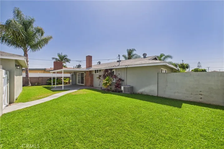 Large grass areas in back and front!