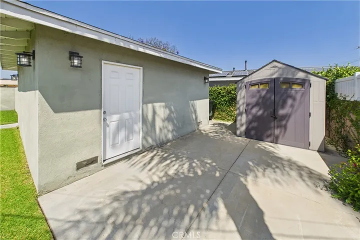Garage entrance and storage shed