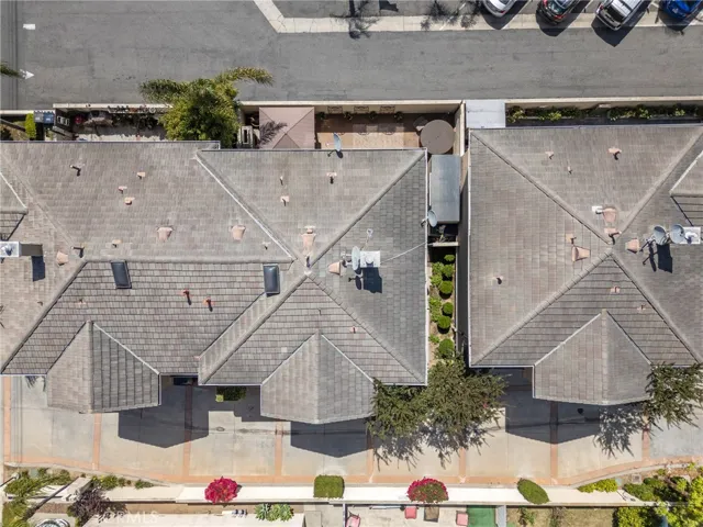 Bird’s-eye view of 7805 Garfield Ave — nestled in a prime interior-tract location just 3 miles from the ocean.