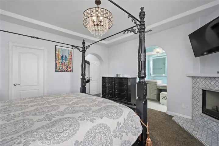 Welcome to your luxurious primary suite — a tranquil retreat with modern elegance.