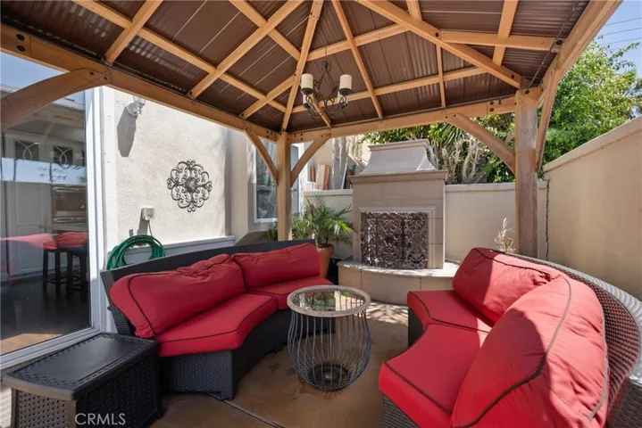 Host friends for weekend BBQs or cozy up with a drink by the firepit — this space does it all.