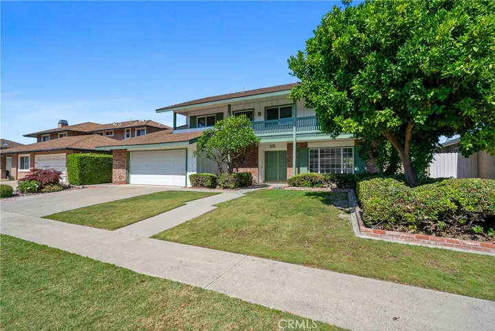 Enjoy your nicely landscaped front yard and attached garage!