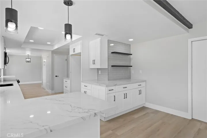 A thoughtful layout makes this remodeled kitchen both beautiful and efficient.