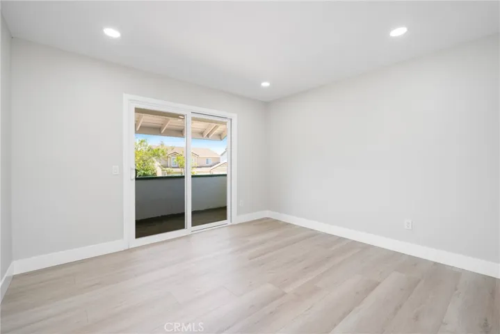 Spacious additional bedroom with direct balcony access and lots of light.
