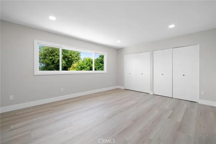 The primary bedroom is bright and spacious.