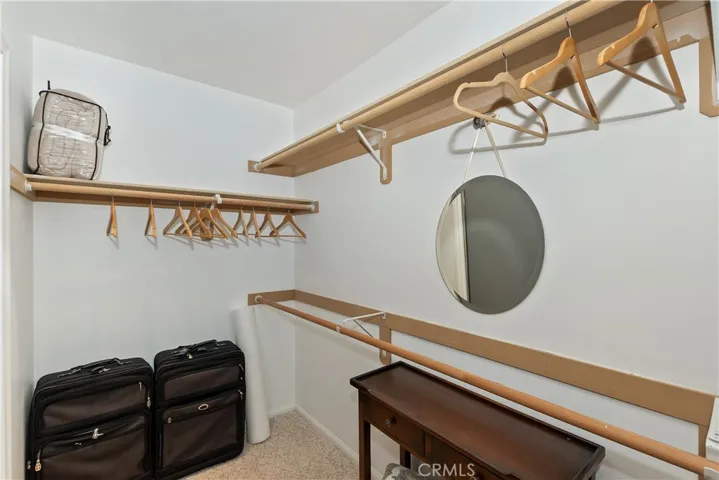 Walk-In Closet In Primary Bedroom