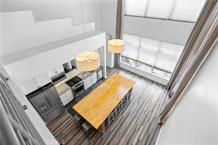 Soaring ceilings are dramatic and lend to an open floorplan.