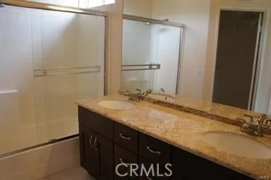 Master bathroom with Dual Sink Vanity & Walk-In Closit