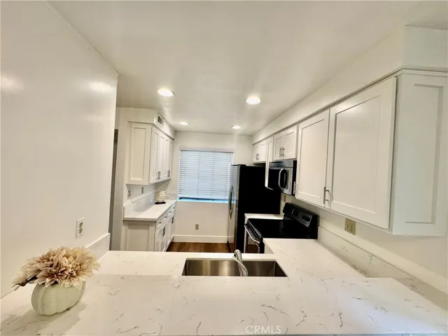 Looking into the kitchen from the dining room