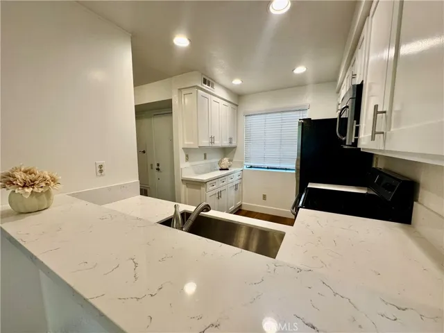 Looking into the kitchen from dining room