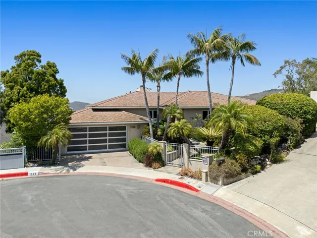 This is a rare opportunity to own a coastal sanctuary that embodies the essence of Laguna Beach luxury living.