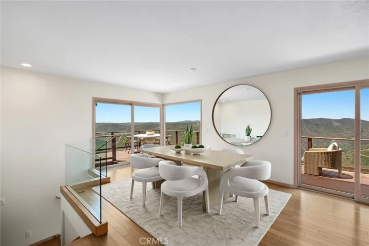Perfectly positioned on an expansive 11,461 sq ft (approx.) lot at the end of a quiet cul-de-sac, this residence showcases stunning ocean and mountain views and offers approximately 2,111 sq ft of thoughtfully designed living space.
